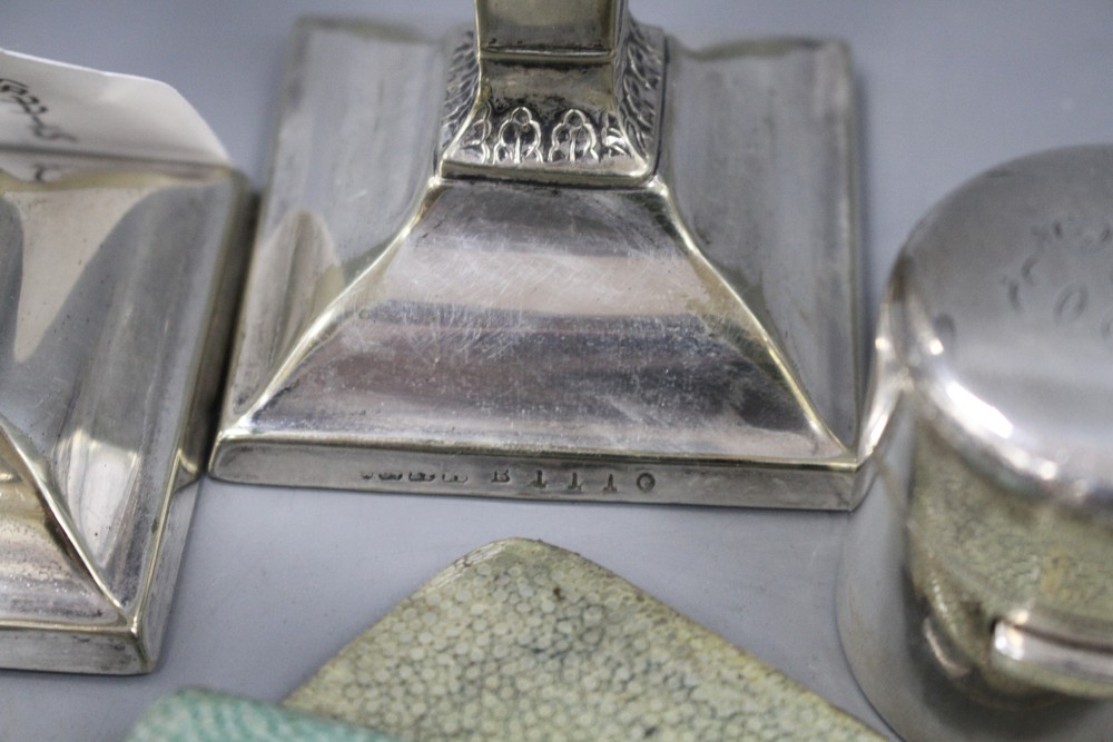 A pair of modern silver dwarf candlestick, Birmingham, 1963, 10.7cm, loaded and six other items.